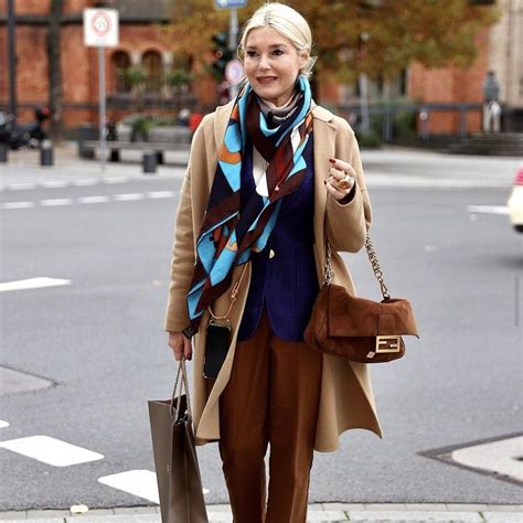 how to wear big hermes scarf|Hermes scarf street style.